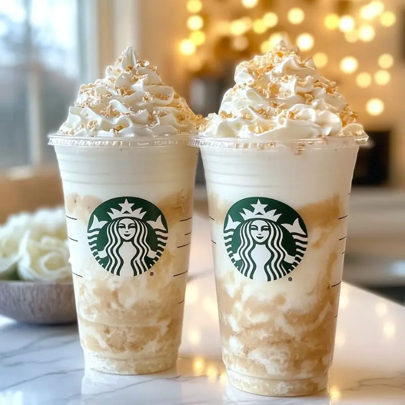 Creamy heavenly vanilla cloud frappuccino with whipped cream and white chocolate drizzle