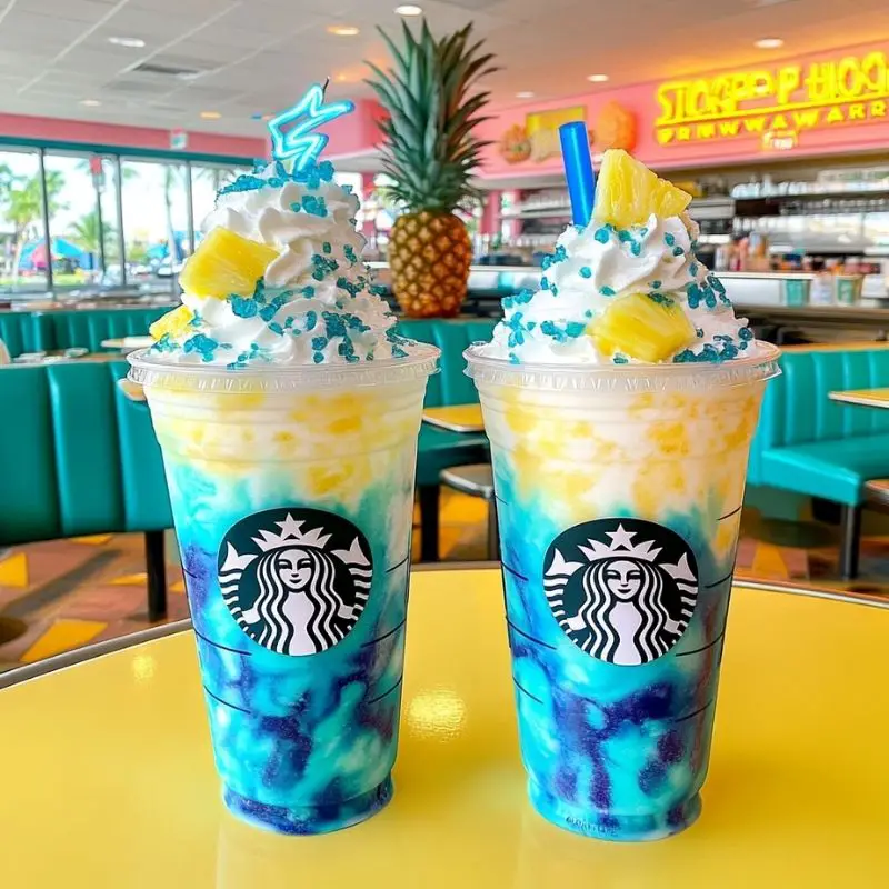 Blue Pineapple Shockwave Frappuccino with whipped cream and galaxy syrup drizzle