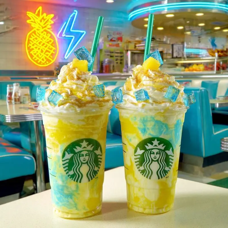Blue Pineapple Shockwave Frappuccino with whipped cream and galaxy syrup drizzle