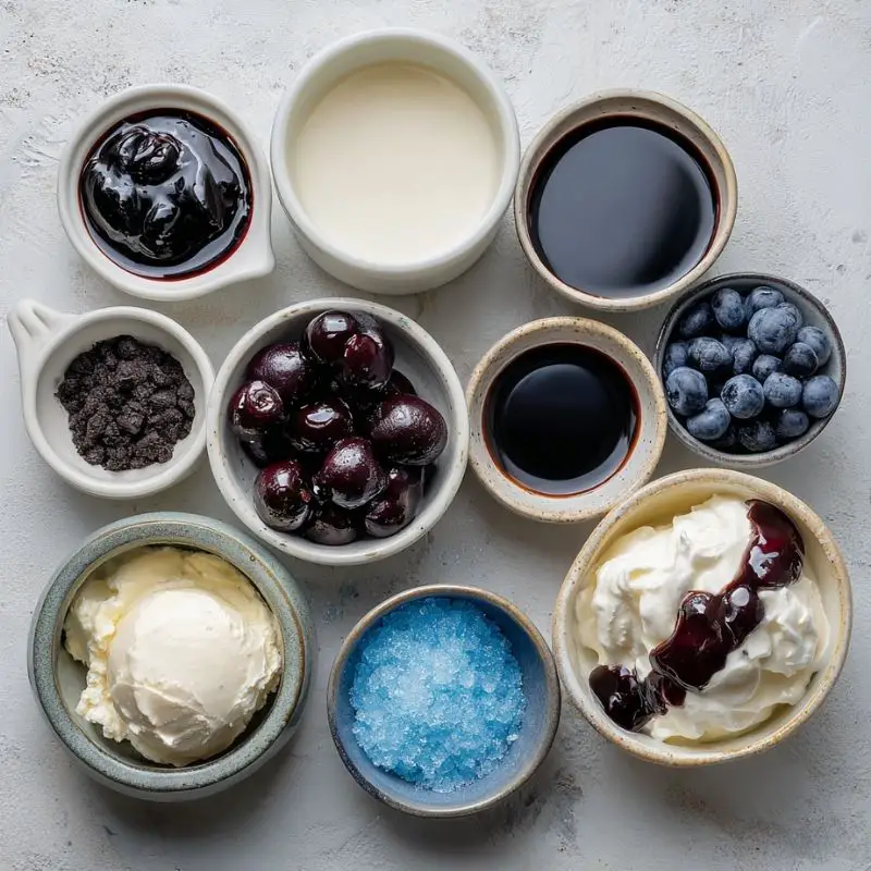Midnight Blue Cherry Frappuccino in glass with whipped cream and cocoa drizzle